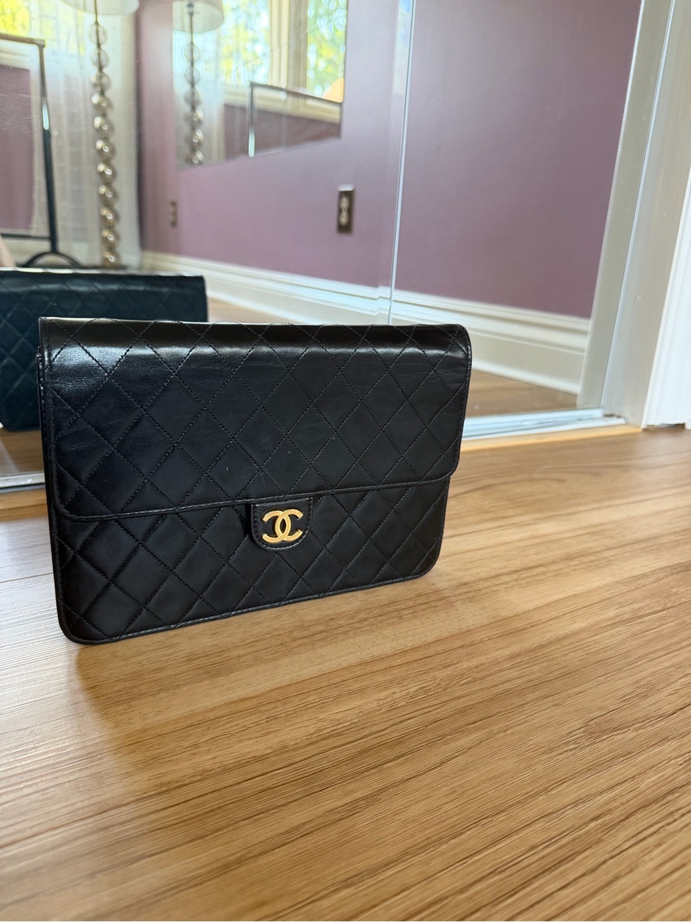 CHANEL Black Quilted Lambskin monoflap with Gold CC Emblem